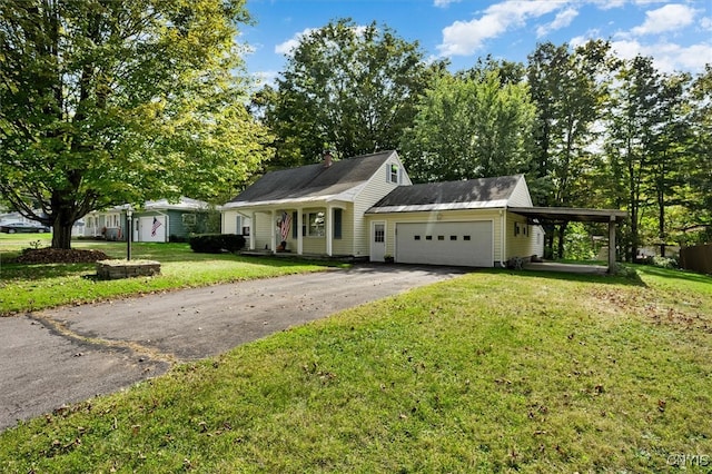 view of front of property featuring a garage and a front yard