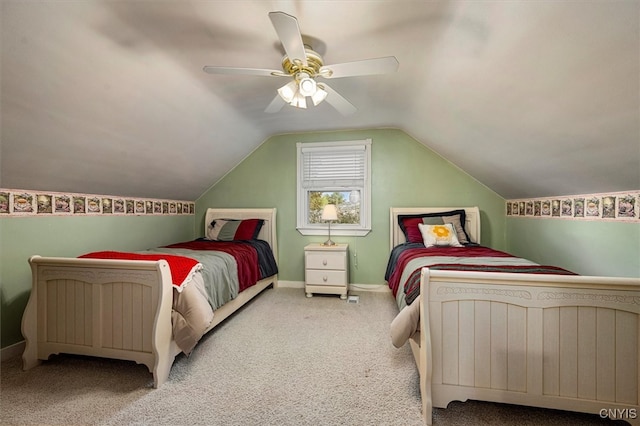 bedroom featuring carpet, vaulted ceiling, and ceiling fan