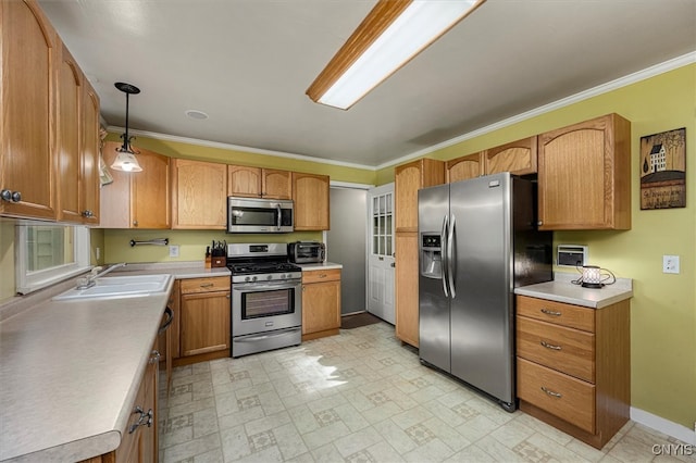 kitchen featuring ornamental molding, stainless steel appliances, hanging light fixtures, and sink