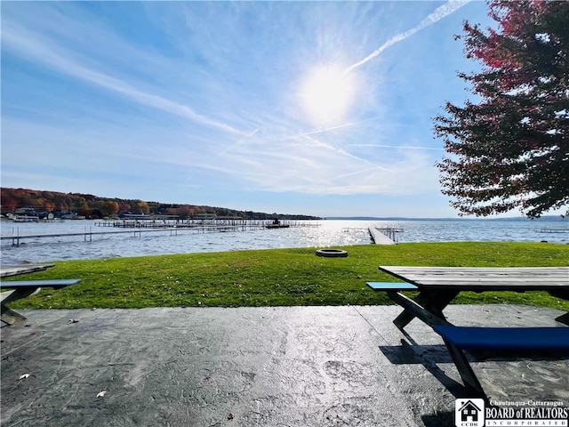 view of patio / terrace featuring a water view