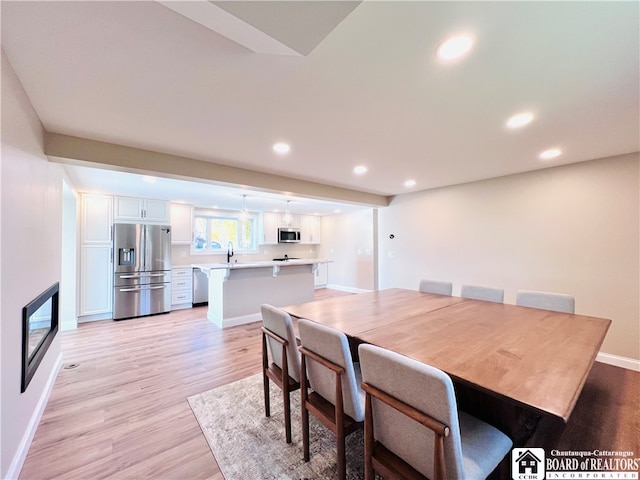 dining area featuring light hardwood / wood-style flooring