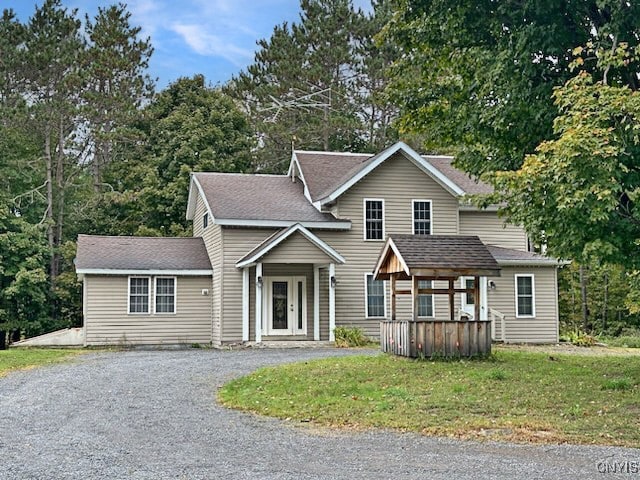 view of property featuring a front yard