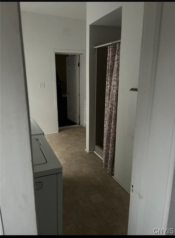 hallway with washer / clothes dryer