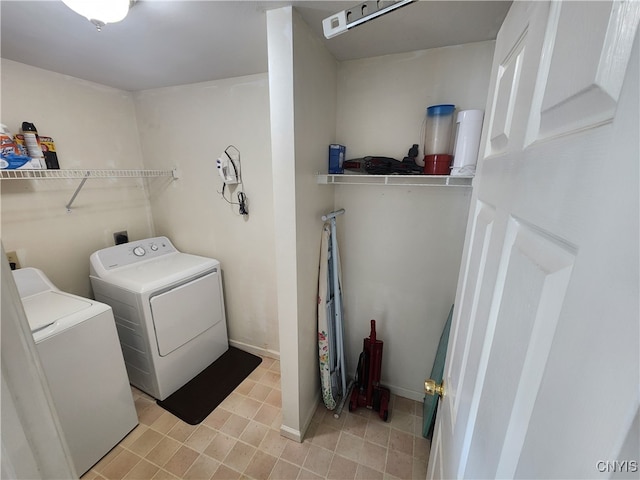 laundry room with washing machine and dryer