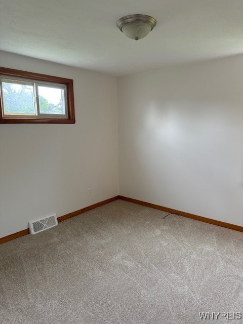 view of carpeted spare room