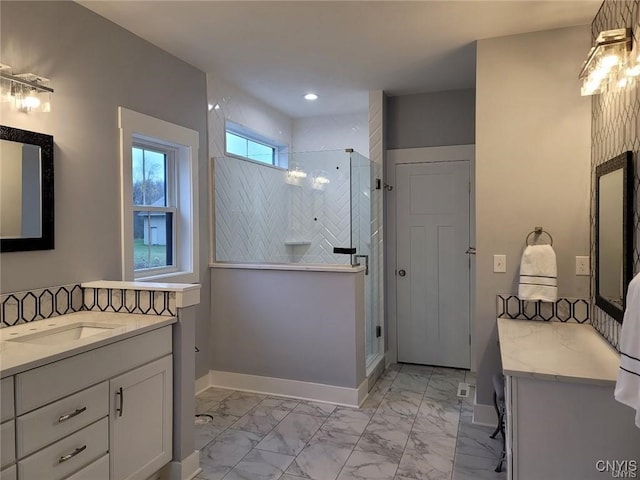 bathroom with vanity and an enclosed shower