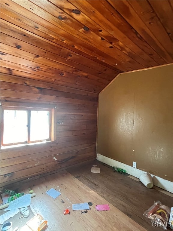 additional living space featuring wood ceiling and vaulted ceiling