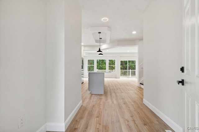 corridor featuring light hardwood / wood-style floors