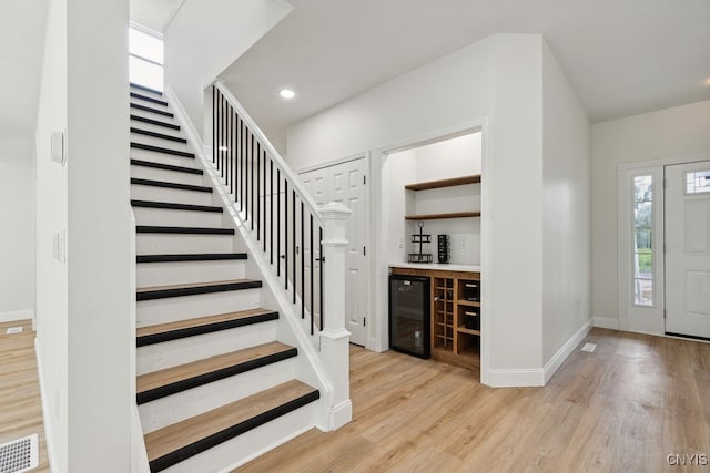 foyer with light hardwood / wood-style flooring