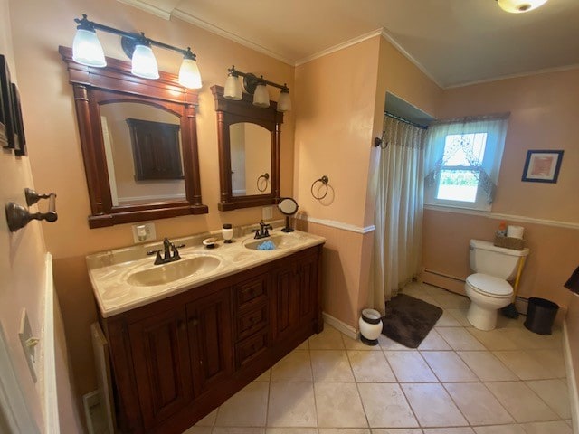 bathroom featuring ornamental molding, vanity, tile patterned flooring, and toilet