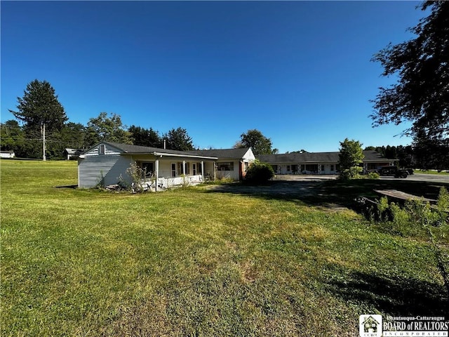 3682 Rte 430, Ellery, NY 14712 - back of house featuring a lawn