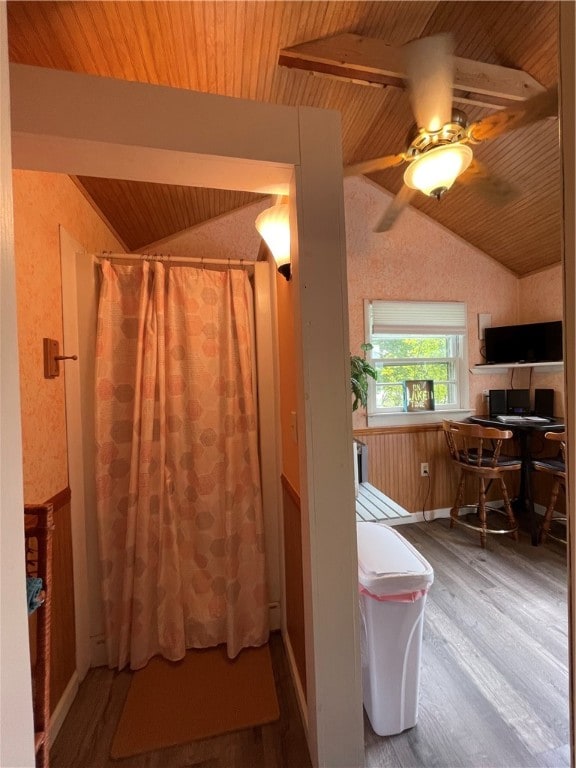 bathroom with wooden ceiling, vaulted ceiling, ceiling fan, and hardwood / wood-style flooring