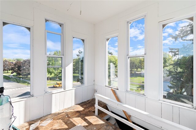 sunroom with plenty of natural light