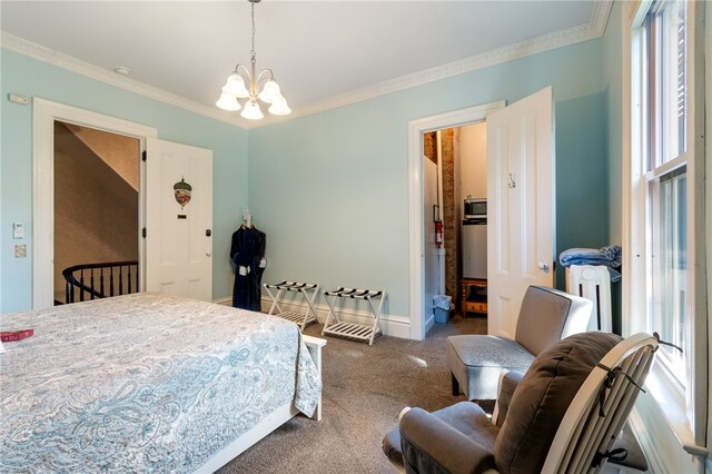 bedroom featuring an inviting chandelier, ornamental molding, and carpet