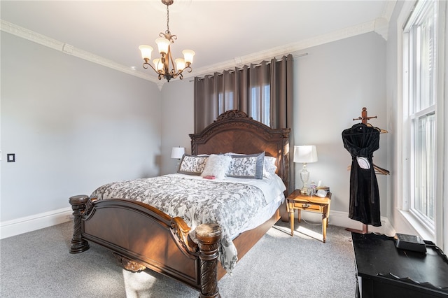 carpeted bedroom with ornamental molding, multiple windows, and a notable chandelier