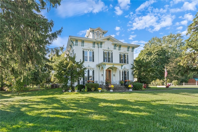 italianate home with a front yard