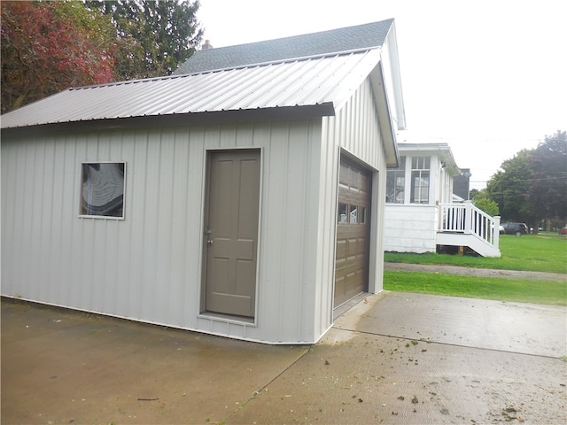 view of outdoor structure with a garage