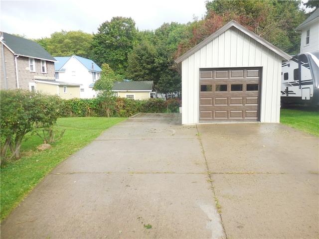 garage with a yard