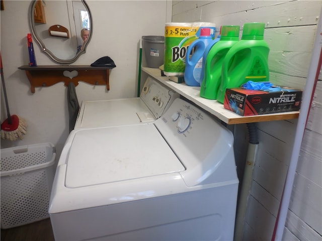 washroom featuring washer and clothes dryer