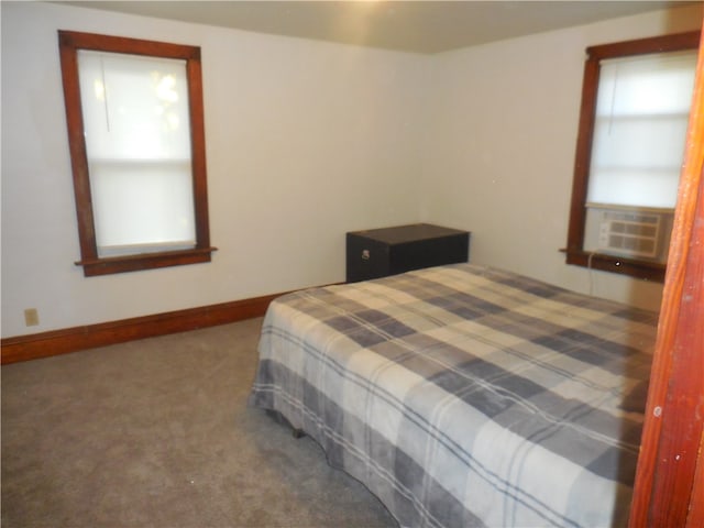 carpeted bedroom featuring cooling unit