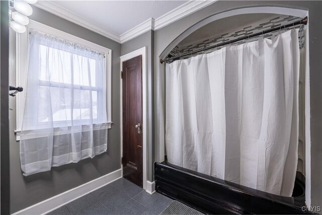 bathroom with ornamental molding