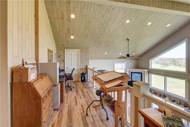 misc room featuring ceiling fan, beamed ceiling, light hardwood / wood-style floors, and wooden ceiling