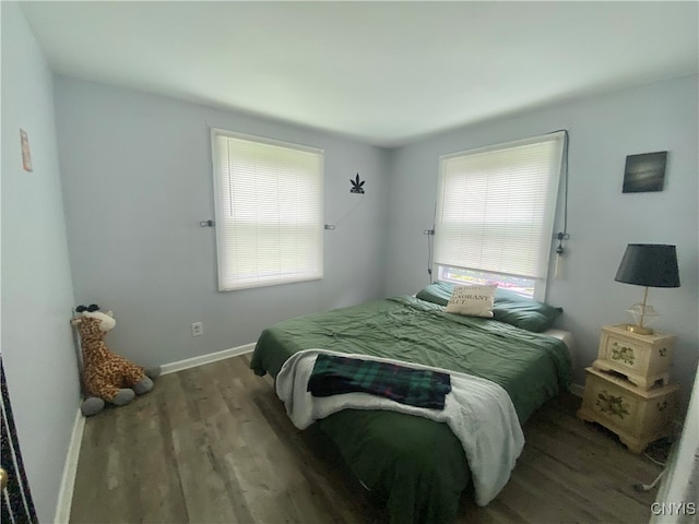 bedroom featuring hardwood / wood-style flooring