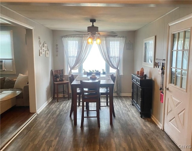 1 Willow Dr, Whitestown, NY 13492 - dining area featuring dark wood finished floors, a ceiling fan, and baseboards