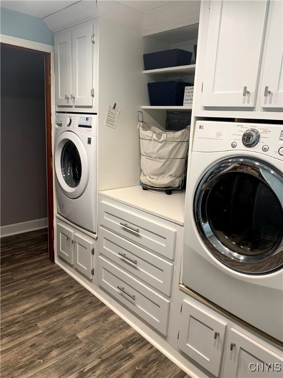 laundry room with dark hardwood / wood-style floors and cabinets