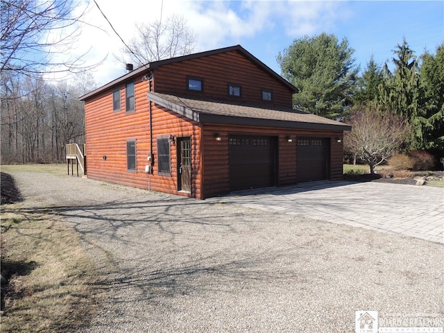 view of home's exterior featuring a garage