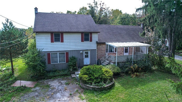 view of front of home with a front yard