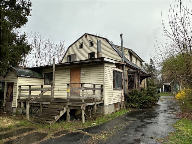 view of front facade with a deck