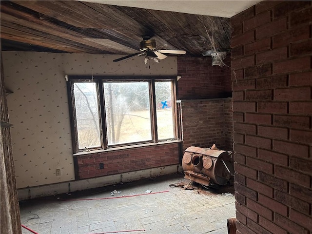 630 W Gray St, Elmira-City, NY 14905 - spare room with ceiling fan and brick wall