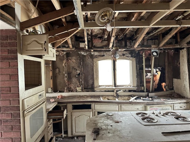 630 W Gray St, Elmira-City, NY 14905 - kitchen with white oven and a sink