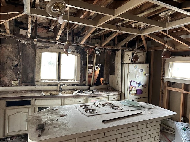 630 W Gray St, Elmira-City, NY 14905 - kitchen with freestanding refrigerator, plenty of natural light, a sink, and cooktop