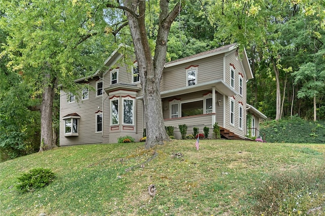 view of front of property with a front lawn