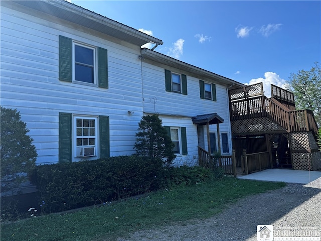 view of front of home with a deck