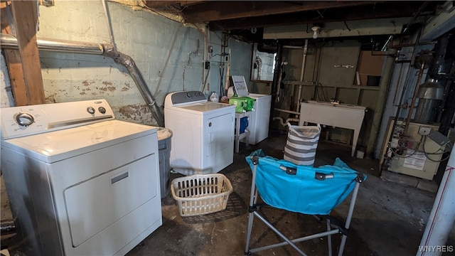 laundry room featuring independent washer and dryer