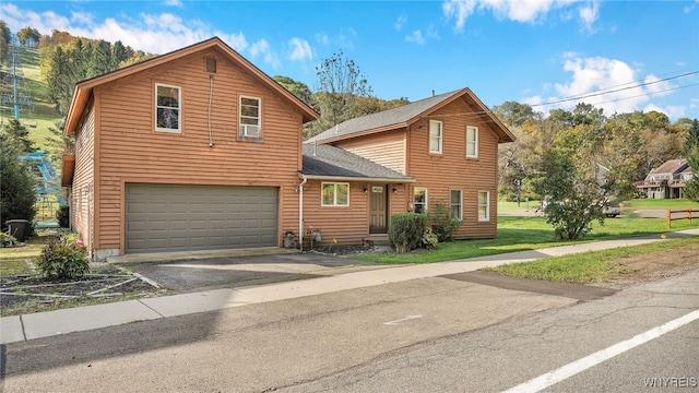 view of property featuring a garage