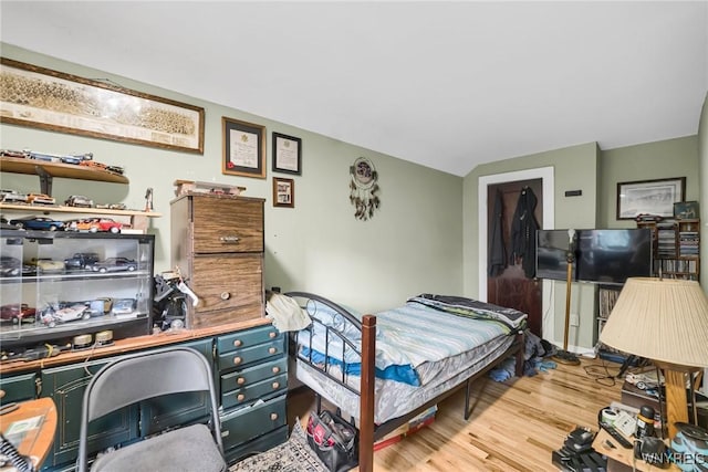 bedroom featuring light wood-type flooring