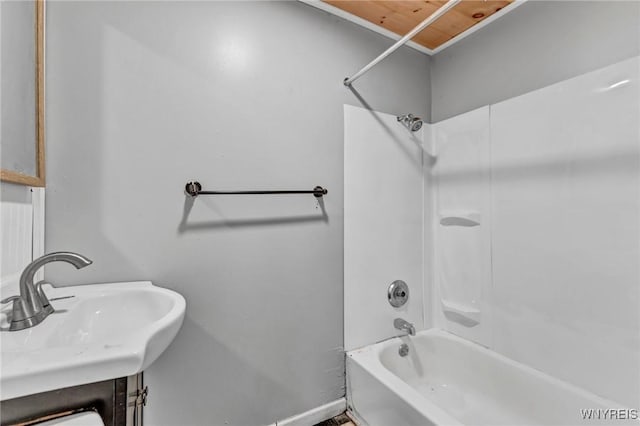 bathroom featuring sink and tub / shower combination