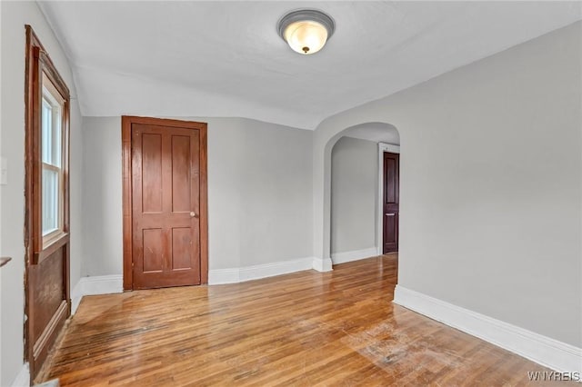 spare room with light wood-type flooring