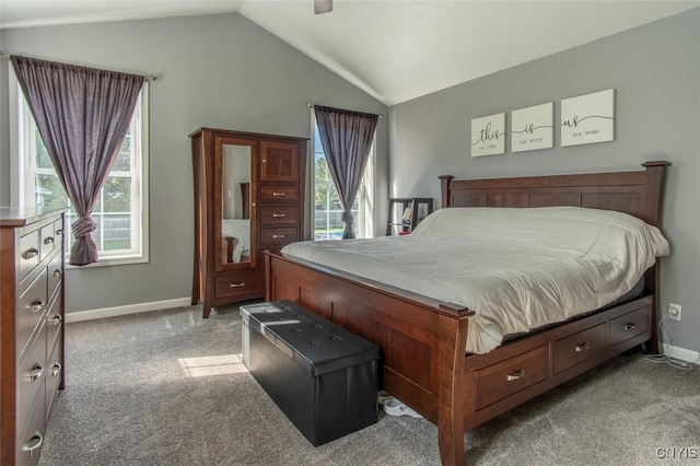 carpeted bedroom with vaulted ceiling