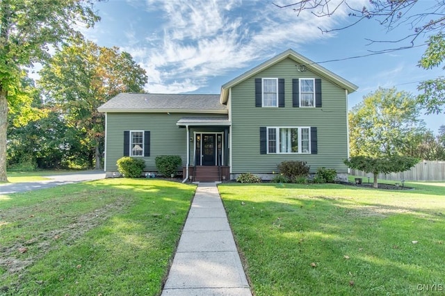 view of front of property with a front lawn