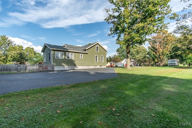 exterior space with a yard