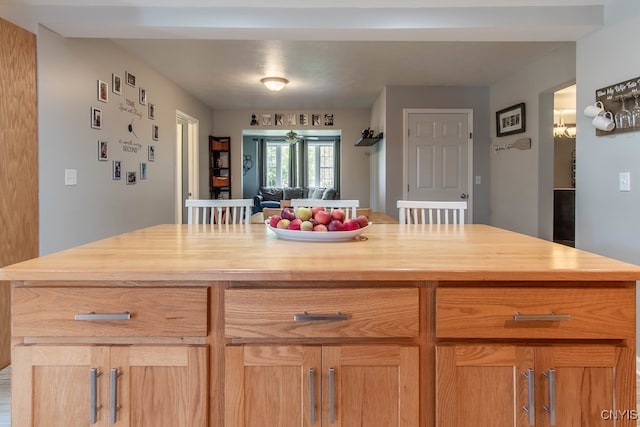 kitchen featuring butcher block countertops and a kitchen island