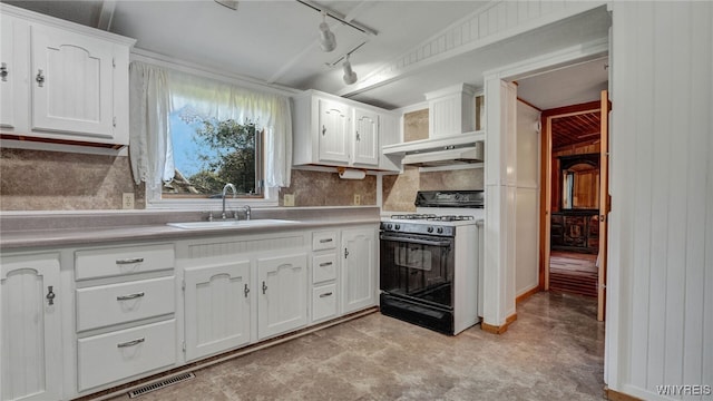 kitchen with white cabinets, ventilation hood, black range with gas cooktop, track lighting, and sink