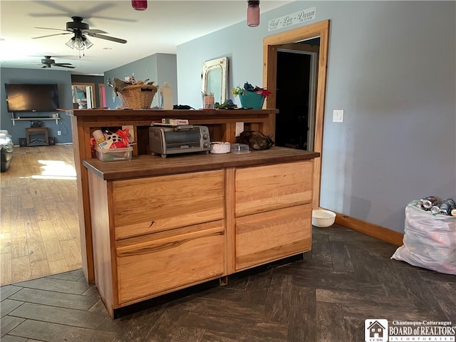 kitchen featuring ceiling fan