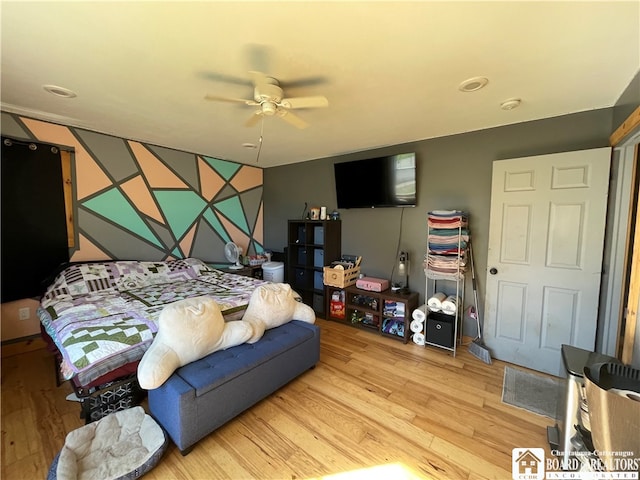 bedroom featuring ceiling fan and light hardwood / wood-style floors