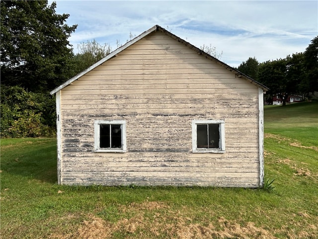 view of home's exterior featuring a yard